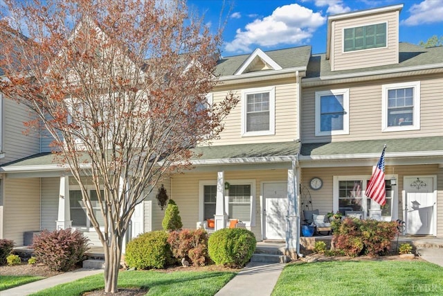 231 Mountain Cove Dr Unit 5, Hardy, VA 24101 - view of property featuring covered porch, a front yard, and a shingled roof