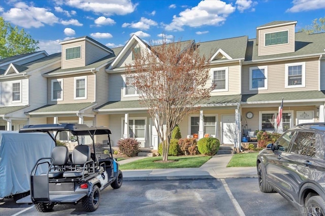 231 Mountain Cove Dr Unit 5, Hardy, VA 24101 - multi unit property featuring a porch, uncovered parking, and roof with shingles
