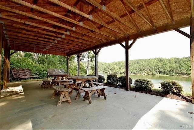 231 Mountain Cove Dr Unit 5, Hardy, VA 24101 - view of patio / terrace with outdoor dining area, a water view, and a wooded view