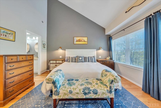 231 Mountain Cove Dr Unit 5, Hardy, VA 24101 - bedroom featuring light wood-type flooring, high vaulted ceiling, and connected bathroom