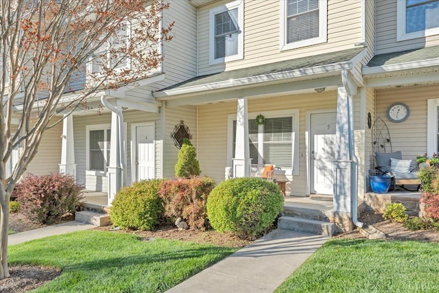 231 Mountain Cove Dr Unit 5, Hardy, VA 24101 - view of exterior entry with covered porch and a shingled roof