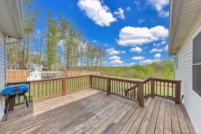 1400 Mountain Cut Rd, Appomattox, VA 24522 - wooden terrace with a storage shed, an outbuilding, a grill, and a fenced backyard
