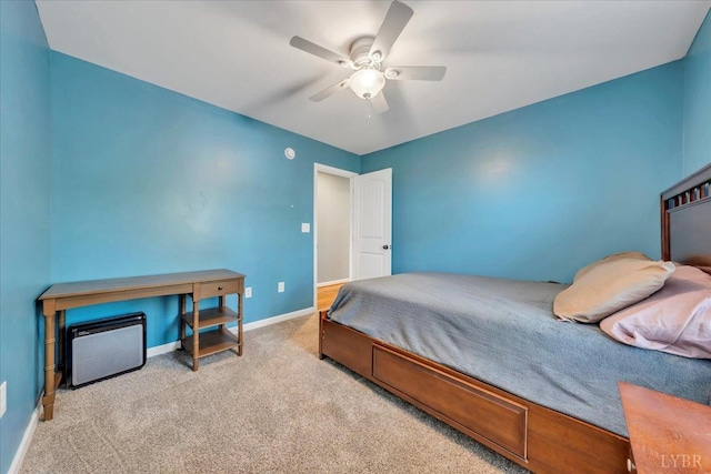 1400 Mountain Cut Rd, Appomattox, VA 24522 - carpeted bedroom featuring baseboards and a ceiling fan