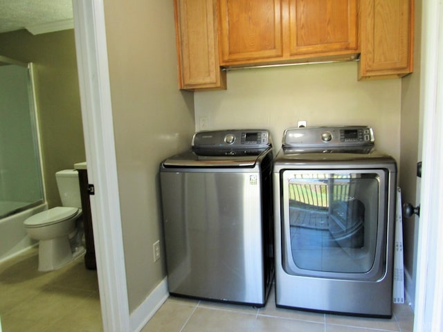 1697 S Amherst Hwy, Amherst, VA 24521 - washroom featuring washer and dryer, light tile patterned floors, and baseboards