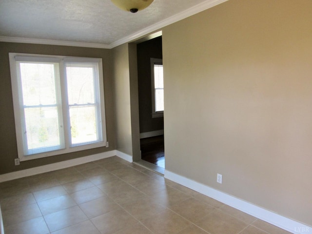 1697 S Amherst Hwy, Amherst, VA 24521 - spare room featuring crown molding, healthy amount of natural light, baseboards, and light tile patterned floors