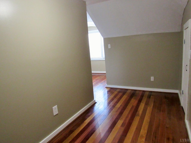 1697 S Amherst Hwy, Amherst, VA 24521 - additional living space with lofted ceiling, dark wood-style floors, and baseboards