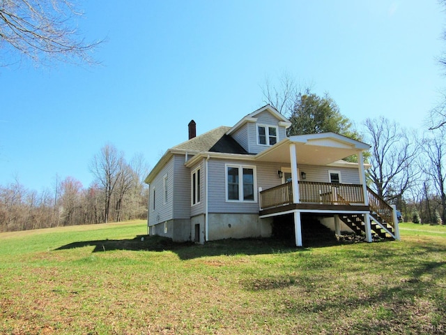 1697 S Amherst Hwy, Amherst, VA 24521 - view of front of home featuring a chimney, a deck, a front lawn, and stairway