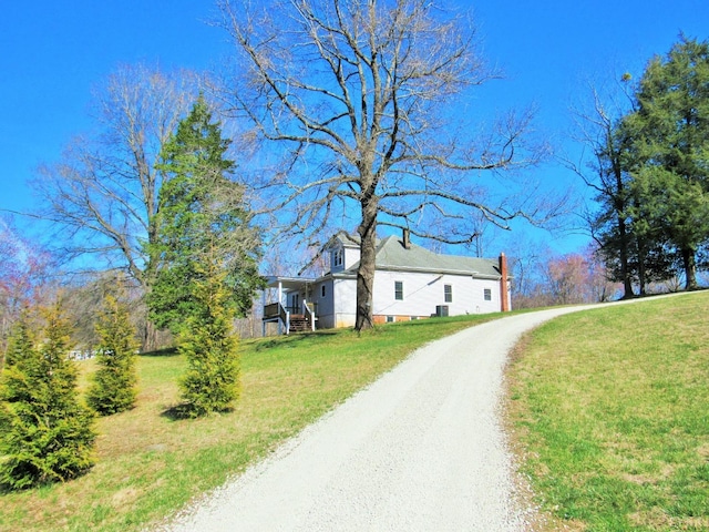 1697 S Amherst Hwy, Amherst, VA 24521 - view of front facade with driveway, a front lawn, and a chimney