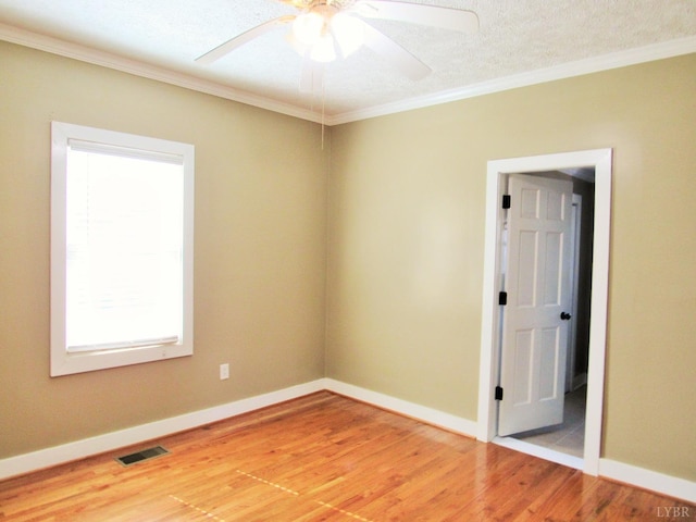 1697 S Amherst Hwy, Amherst, VA 24521 - empty room featuring light wood-style flooring, crown molding, baseboards, and a ceiling fan