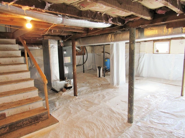 1697 S Amherst Hwy, Amherst, VA 24521 - below grade area with stairs, a water pressure tank, and heating unit