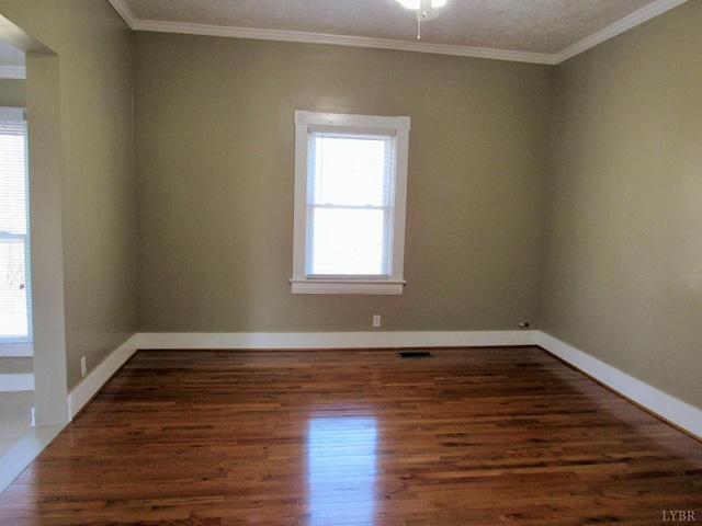 1697 S Amherst Hwy, Amherst, VA 24521 - empty room featuring wood finished floors, crown molding, and baseboards
