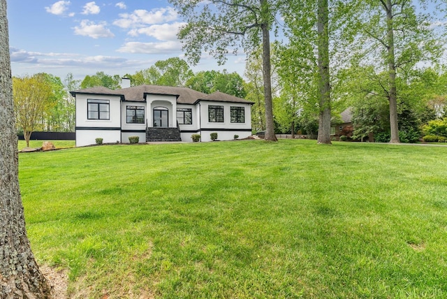 1208 Rocky Branch Dr, Forest, VA 24551 - french provincial home with a front yard, a chimney, and roof with shingles