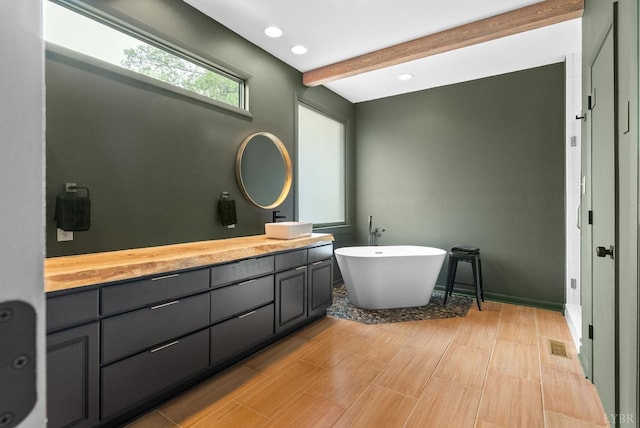 1208 Rocky Branch Dr, Forest, VA 24551 - full bath with vanity, a freestanding bath, beamed ceiling, and recessed lighting
