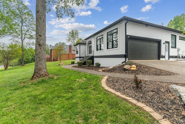1208 Rocky Branch Dr, Forest, VA 24551 - view of home's exterior featuring an attached garage, stucco siding, concrete driveway, and a lawn