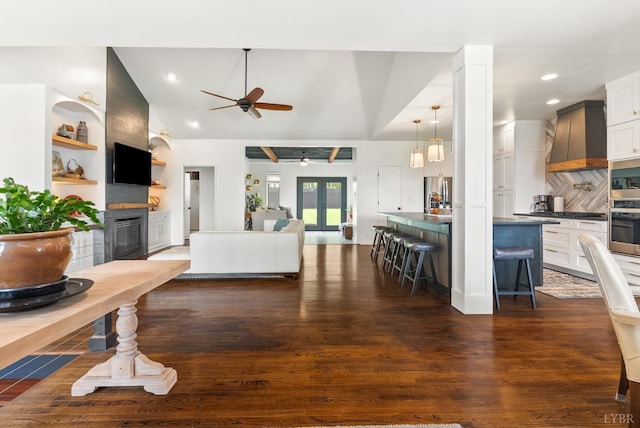 1208 Rocky Branch Dr, Forest, VA 24551 - living area featuring a fireplace, a ceiling fan, dark wood finished floors, lofted ceiling, and recessed lighting