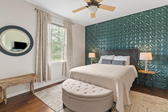 1208 Rocky Branch Dr, Forest, VA 24551 - bedroom featuring wood-type flooring, an accent wall, baseboards, and ceiling fan