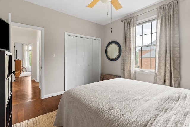 1208 Rocky Branch Dr, Forest, VA 24551 - bedroom with wood finished floors, a closet, baseboards, and a ceiling fan