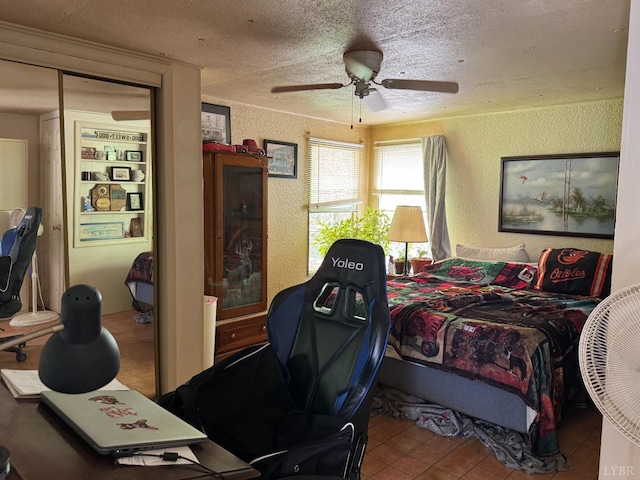 202 Stallion Way, Amherst, VA 24521 - bedroom with a textured wall, a textured ceiling, a closet, tile patterned floors, and ceiling fan