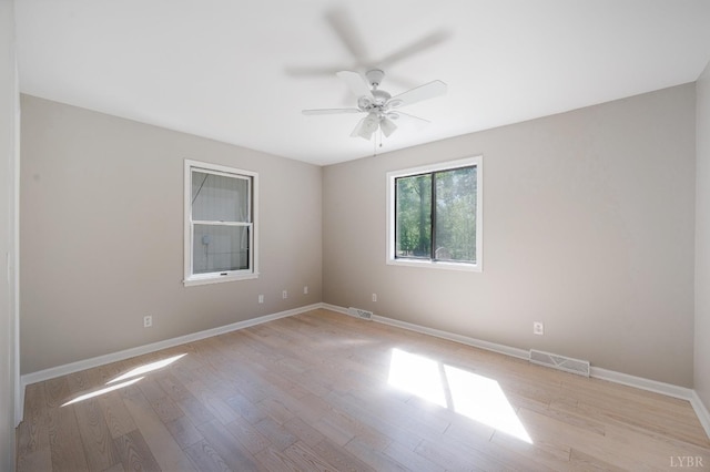 1132 Bancroft, Goode, VA 24556 - unfurnished room with visible vents, a ceiling fan, and light wood-style floors
