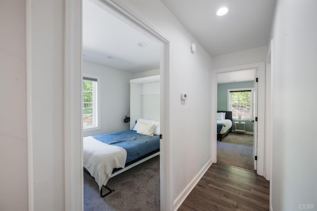 1132 Bancroft, Goode, VA 24556 - hall featuring recessed lighting, baseboards, dark colored carpet, and dark wood-style flooring