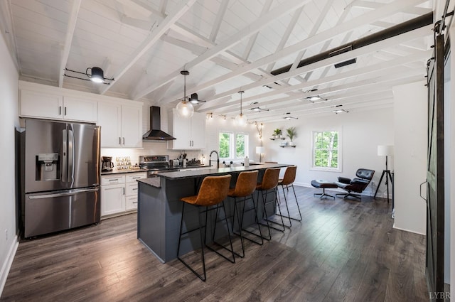 1132 Bancroft, Goode, VA 24556 - kitchen with dark countertops, white cabinets, stainless steel appliances, wall chimney exhaust hood, and an island with sink