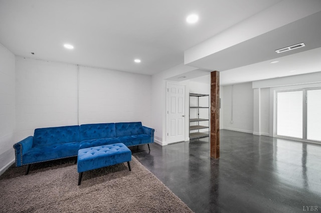 1132 Bancroft, Goode, VA 24556 - living area featuring visible vents, recessed lighting, finished concrete floors, and concrete block wall