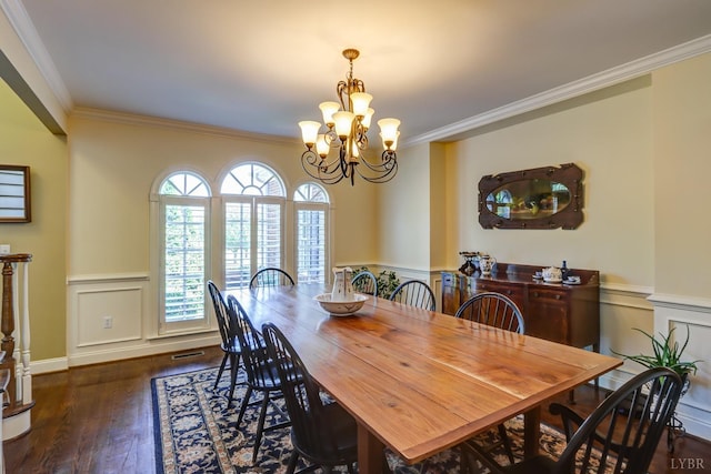107 Emory Way, Amherst, VA 24521 - dining room with a chandelier, crown molding, a wainscoted wall, a decorative wall, and dark wood-style floors