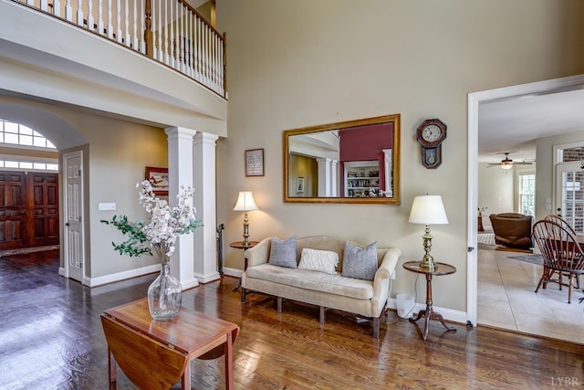107 Emory Way, Amherst, VA 24521 - living room featuring ceiling fan, a high ceiling, baseboards, and wood finished floors