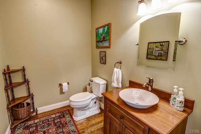 107 Emory Way, Amherst, VA 24521 - half bath with toilet, baseboards, wood finished floors, and vanity