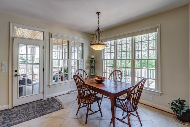 107 Emory Way, Amherst, VA 24521 - dining space with baseboards, light tile patterned floors, and plenty of natural light