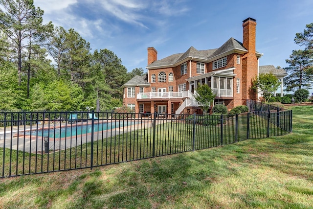 107 Emory Way, Amherst, VA 24521 - rear view of property with fence private yard, a sunroom, a chimney, and brick siding