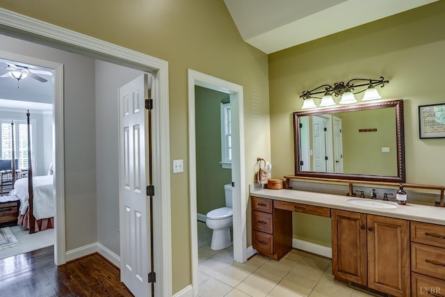 107 Emory Way, Amherst, VA 24521 - ensuite bathroom featuring lofted ceiling, toilet, ceiling fan, vanity, and connected bathroom