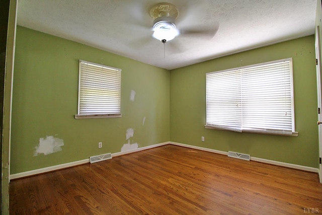 3958 Campbell Hwy, Lynchburg, VA 24501 - empty room with a ceiling fan, wood finished floors, and baseboards