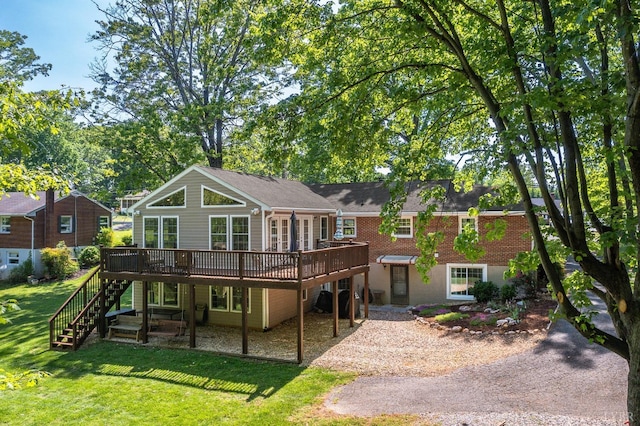 1206 Cedar Hill Dr, Lynchburg, VA 24502 - rear view of property featuring a wooden deck, a yard, and stairway