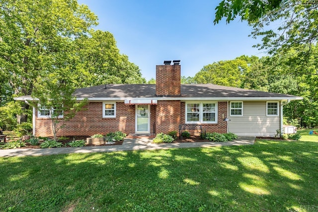 1206 Cedar Hill Dr, Lynchburg, VA 24502 - view of front of house featuring a chimney, a front yard, and brick siding