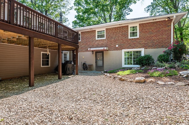 1206 Cedar Hill Dr, Lynchburg, VA 24502 - rear view of house featuring a wooden deck and brick siding