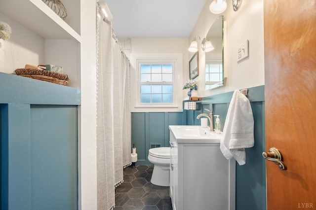 1206 Cedar Hill Dr, Lynchburg, VA 24502 - full bath with vanity, tile patterned flooring, and a wainscoted wall