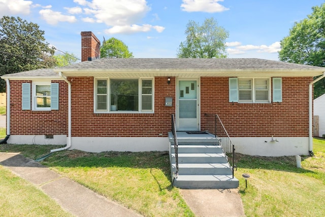 4600 Greenwood Dr, Lynchburg, VA 24502 - bungalow featuring brick siding, a chimney, and a front yard