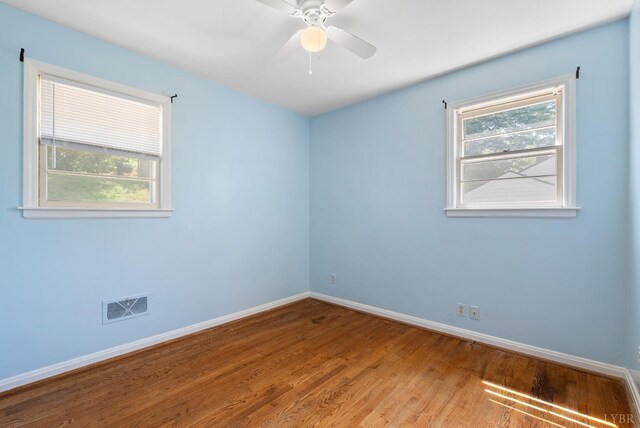 4600 Greenwood Dr, Lynchburg, VA 24502 - spare room featuring baseboards, wood finished floors, and ceiling fan