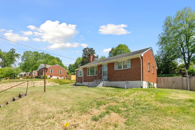 4600 Greenwood Dr, Lynchburg, VA 24502 - rear view of house featuring brick siding and a chimney