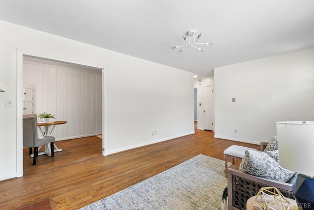 4600 Greenwood Dr, Lynchburg, VA 24502 - sitting room with wood finished floors, baseboards, and a chandelier