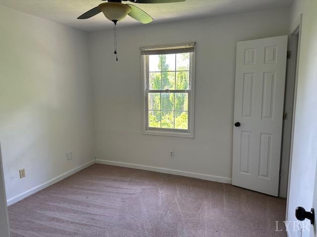 202 Rustwood Ct, Rustburg, VA 24588 - carpeted empty room featuring a ceiling fan and baseboards
