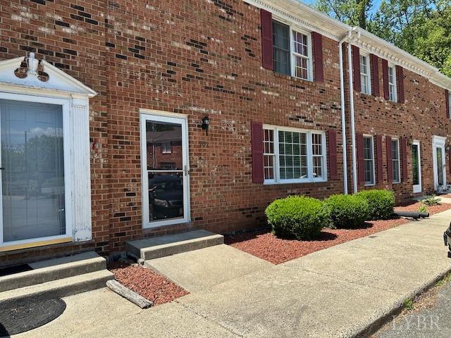 202 Rustwood Ct, Rustburg, VA 24588 - view of exterior entry with brick siding