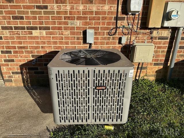 202 Rustwood Ct, Rustburg, VA 24588 - exterior details featuring brick siding, central AC, and electric meter