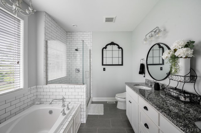 1205 Bradford Crossing Pl, Goode, VA 24556 - full bath featuring visible vents, a garden tub, vanity, toilet, and a stall shower