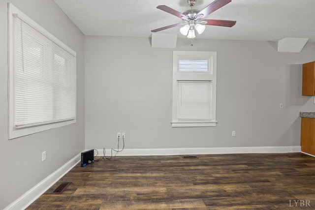 609 Jackson St, Lynchburg, VA 24504 - spare room featuring baseboards, wood finished floors, a ceiling fan, and a textured ceiling