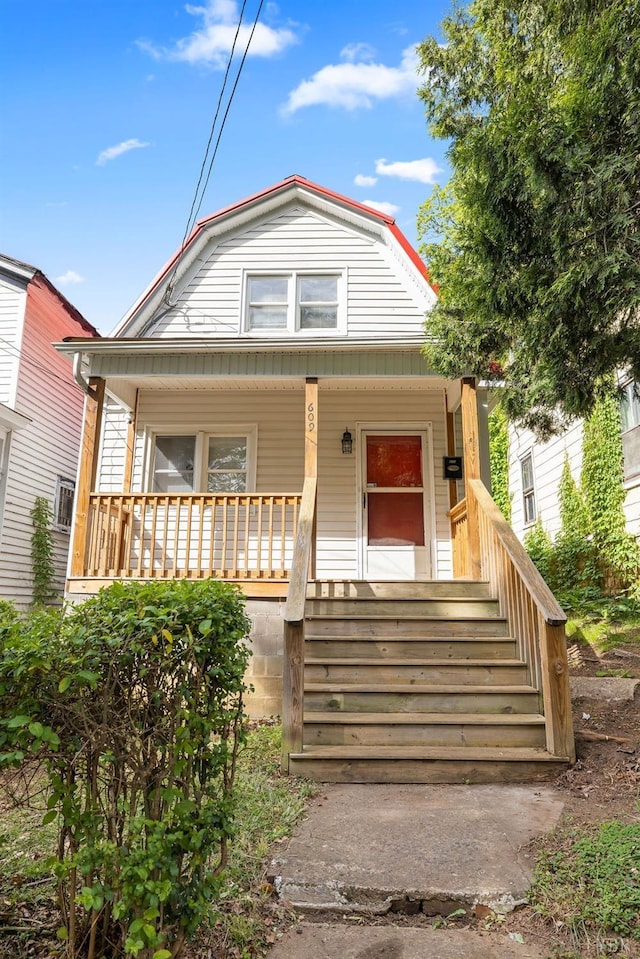 609 Jackson St, Lynchburg, VA 24504 - view of front of property featuring a gambrel roof and covered porch