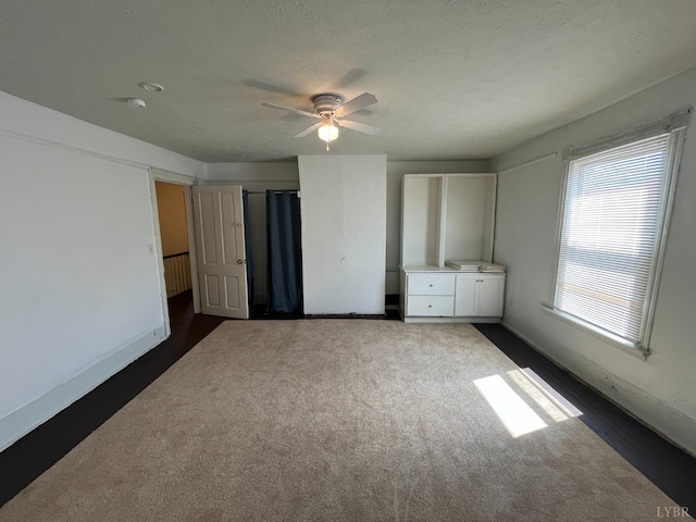 1603 Taylor St, Lynchburg, VA 24504 - unfurnished bedroom with dark carpet and baseboards