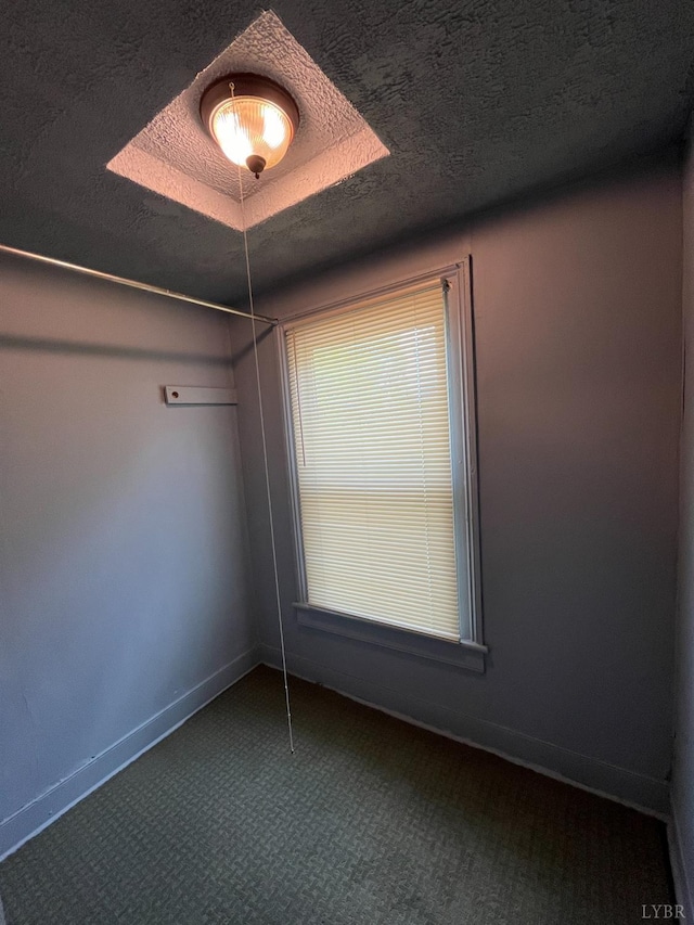 1603 Taylor St, Lynchburg, VA 24504 - spare room with carpet flooring, a textured ceiling, and baseboards