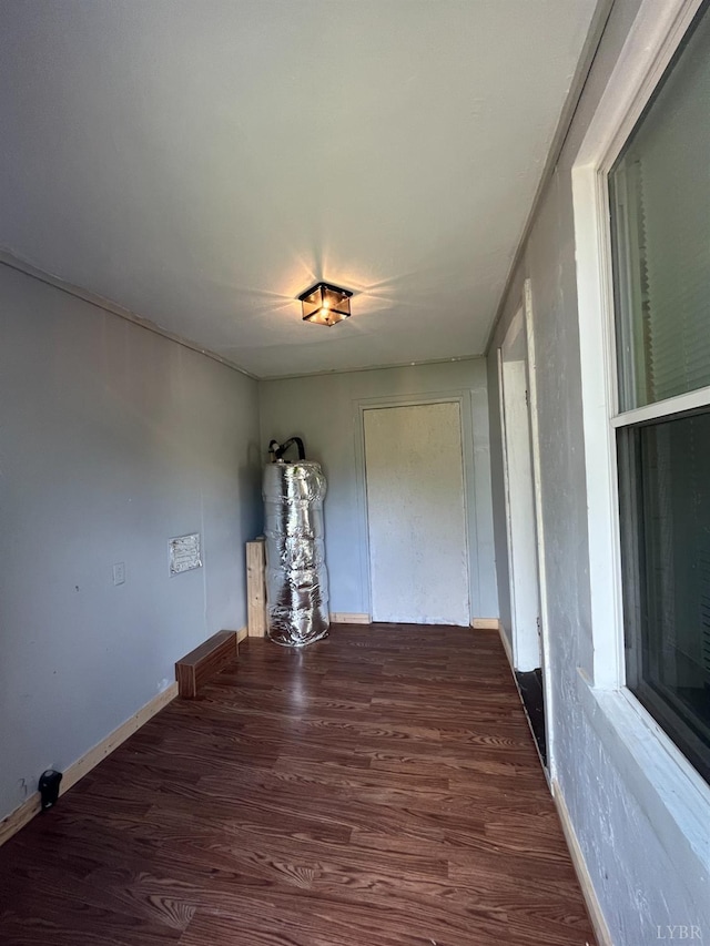 1603 Taylor St, Lynchburg, VA 24504 - unfurnished room featuring wood finished floors, water heater, and baseboards